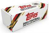 2003 Topps Football hand collated complete set storage box with red gold black diagonal graphics and one 385-card badge